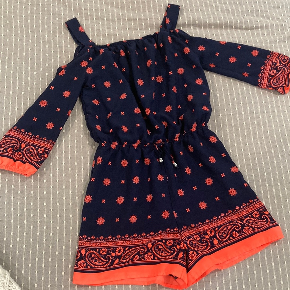 My Michelle girls shorts romper in navy and orange with open shoulders